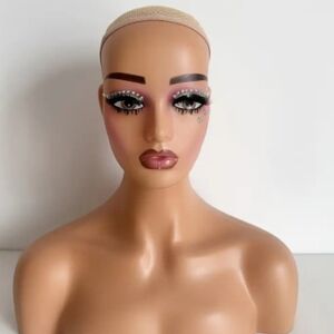 Elegant Makeup Mannequin Head with Pink and Brown Tones